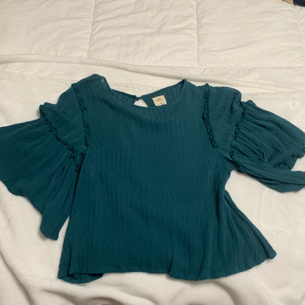 teal blouse